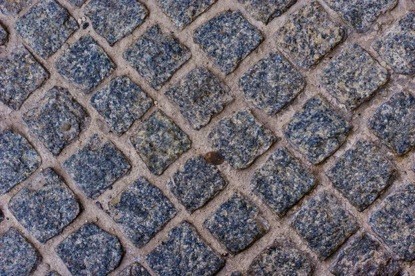 Geometry pattern of cobblestone background traditional stone paving — Stock Photo, Image