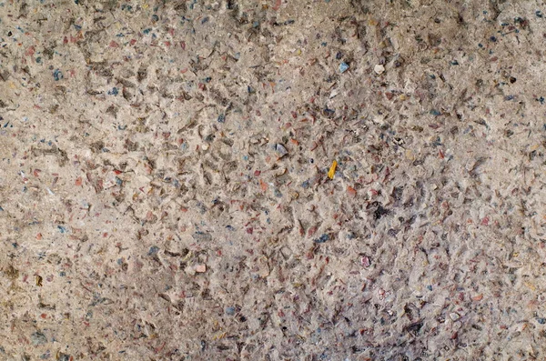 Textura de fundo de uma parede de cimento ou pavimento de concreto com inclusão de pequenas pedras de cascalho — Fotografia de Stock