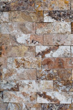 Arka plan bir taş duvar kaplama doku, kahverengi taş tuğla 