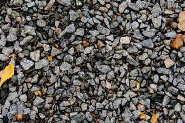 A yakın çekim küçük kayalar, ezilmiş granit, çakıl çakıl doku, çakıl arka plan