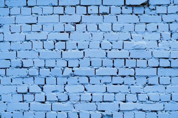 Background of a blue painted brick wall