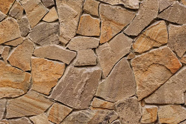 Parede de pedra decorativa moderna de pedra lascada para fundo — Fotografia de Stock
