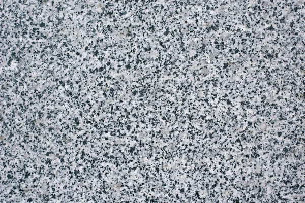 Textura de piedra oscura natural con inclusiones, fondo — Foto de Stock