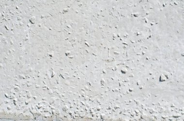 Çatlak ve delikler ile çimento gri duvar dokusu 