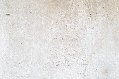 Çatlak ve delikler ile çimento gri duvar dokusu 