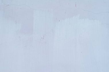 Çatlak ve delikler ile çimento gri duvar dokusu 