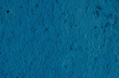 Derin mavi sıva arka plan kaplamalı ve boyalı dış, kaba dökme çimento ve beton duvar doku, dekoratif kaplama 