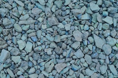 Arka plan Gri çakıl ve ezilmiş taş, yol için inşaat malzemesi