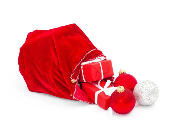 Santa Claus red bag with Christmas balls and gift box — Stock Photo, Image