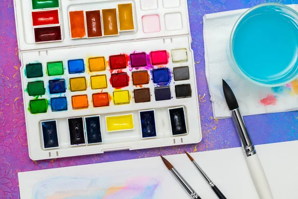 Equipment Painting Bright Palette Watercolors Some Brushes Water Bowl Paper — Stock Photo, Image