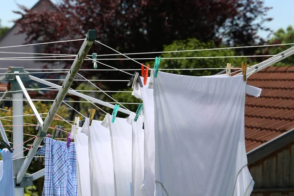 Washing clothes washed on a rope — Stock Photo, Image