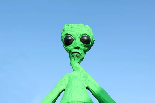 Alien / Aliens - green men arrived on our planet Earth.