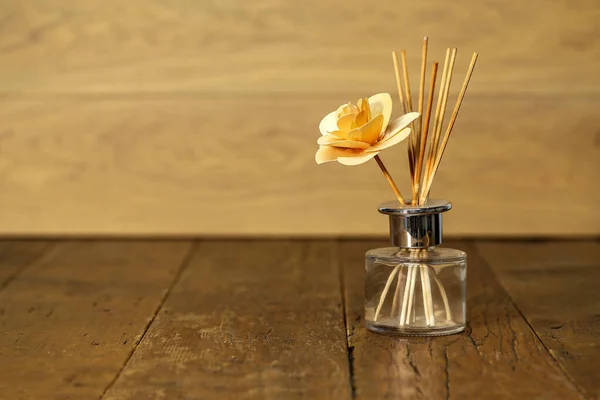 A homemade wooden rose in a vase