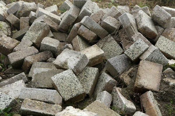 A pile of old paving stones at a construction site — Stock Photo, Image