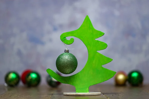 Christmas tree in plywood on a blurry background — Stock Photo, Image