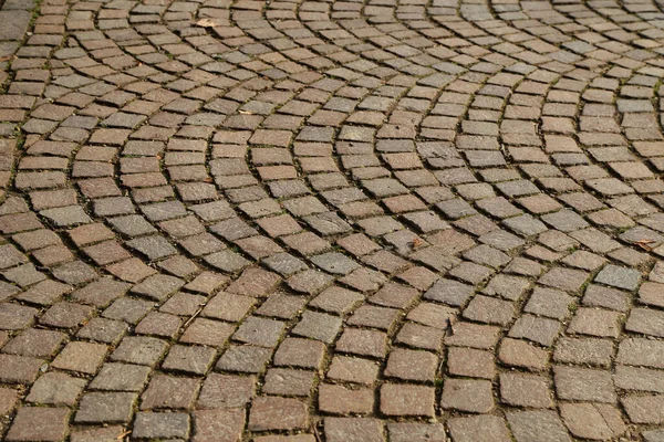 Abstract background of old cobblestone pavement close-up — Stock Photo, Image