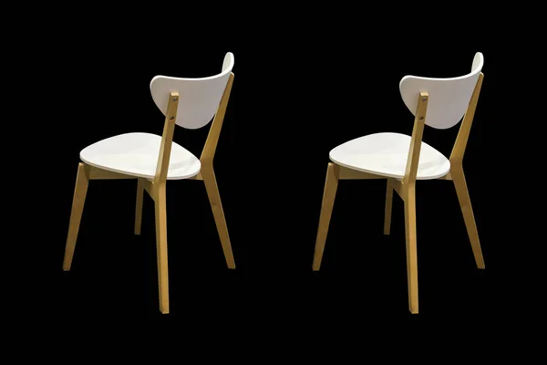 Wooden chairs on black background. — Stock Photo, Image