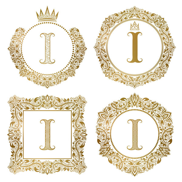 Золотая буква, набор винтажных монограмм. Геральдические гербы, круглые и квадратные рамки
.