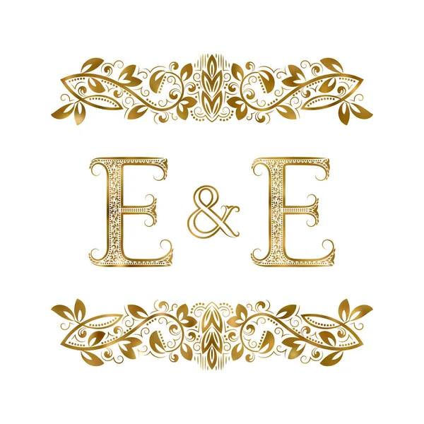 E and E vintage initials logo symbol. The letters are surrounded by ornamental elements — Stock Vector