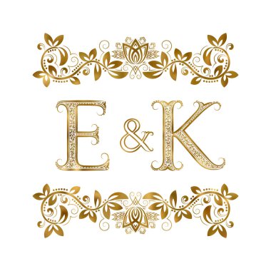 E ve K vintage baş harfleri logo sembolü. Harfleri süs öğeleri tarafından çevrili.