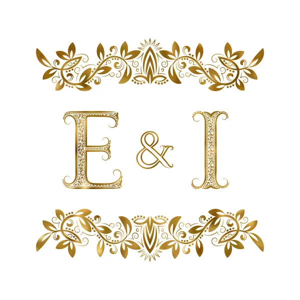 E en ik vintage initials logo symbool. De letters zijn omringd door decoratieve elementen. — Stockvector