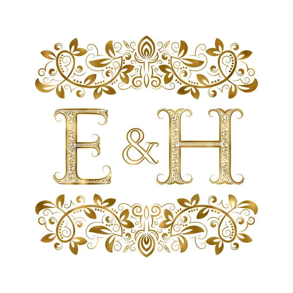 E and H vintage initials logo symbol. The letters are surrounded by ornamental elements. — Stock Vector