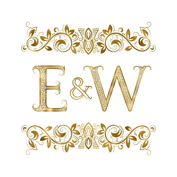 E und w Vintage Initialen Logo-Symbol. die Buchstaben sind von ornamentalen Elementen umgeben. — Stockvektor