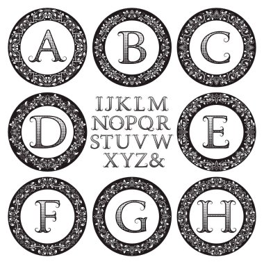 Vintage monogram kiti. Siyah harfler ve Victoria tarzı ilk logo oluşturmak için çiçek yuvarlak kare desenli.