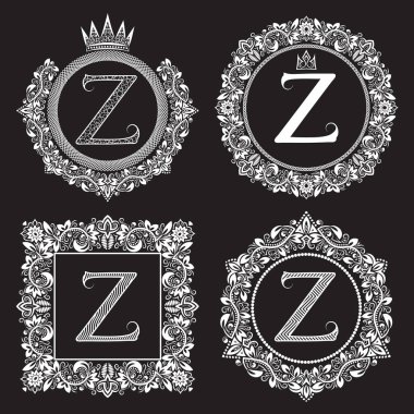 Vintage monograms set of Z letter. Heraldic coats of arms in wreaths, round and square frames. White symbols on black.