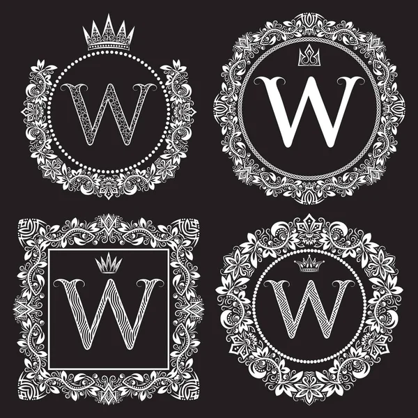 Vintage monograms set of W letter. Heraldic coats of arms in wreaths, round and square frames. White symbols on black. — Stock Vector