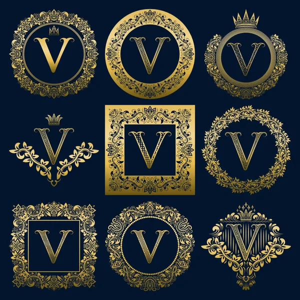 Vintage monograms set of V letter. Golden heraldic logos in wreaths, round and square frames. — Stock Vector