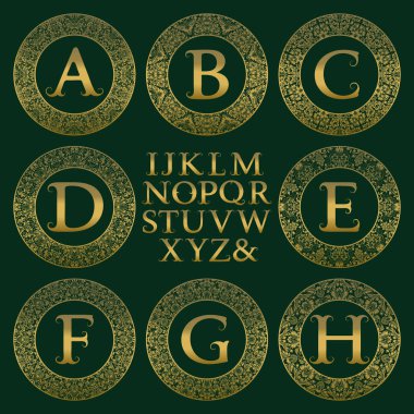 Vintage monogram kiti. Altın harfler ve antik tarzda ilk logo oluşturmak için çiçek yuvarlak çerçeve.