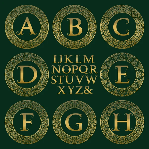 Kit de monograma vintage. Letras douradas e armações redondas florais para criar o logotipo inicial em estilo antigo . —  Vetores de Stock