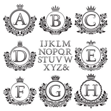 Vintage monogram kiti. Siyah harfler ve antik tarzda ilk logo oluşturmak için çiçek kat kare desenli.