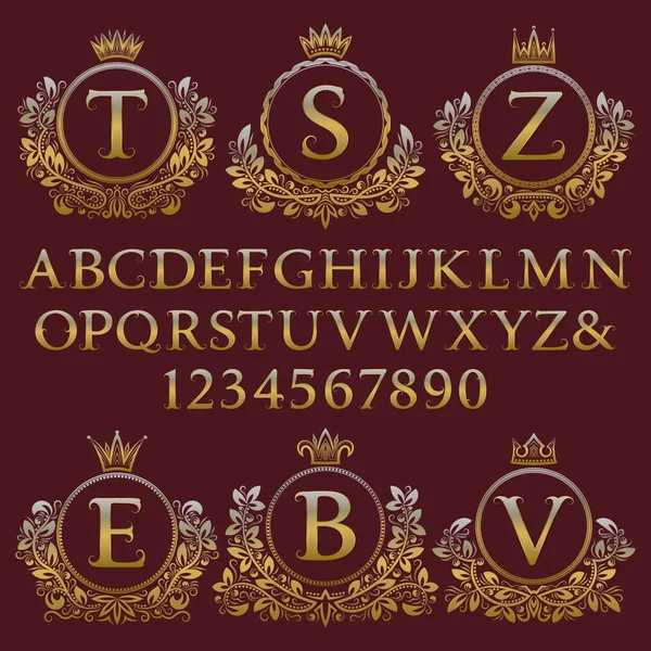 Vintage monogram kiti. Altın harfler, sayılar ve antik tarzda ilk logo oluşturmak için çiçek arması çerçeveler.