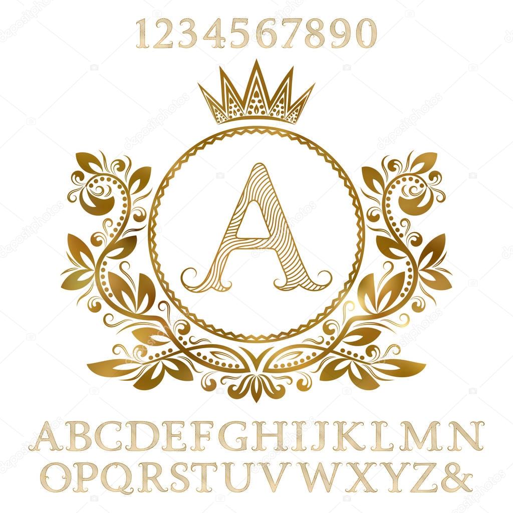 Golden patterned letters and numbers with initial monogram in coat of arms form. Shining font and elements kit for logo design.