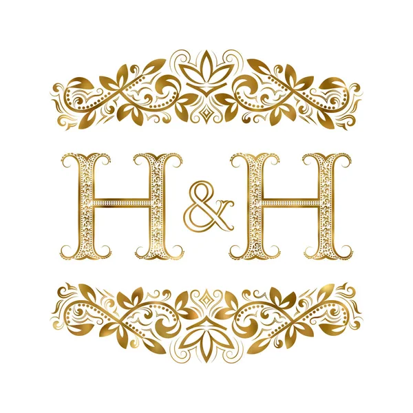 H y H vintage iniciales símbolo del logotipo. Las letras están rodeadas de elementos ornamentales . — Archivo Imágenes Vectoriales