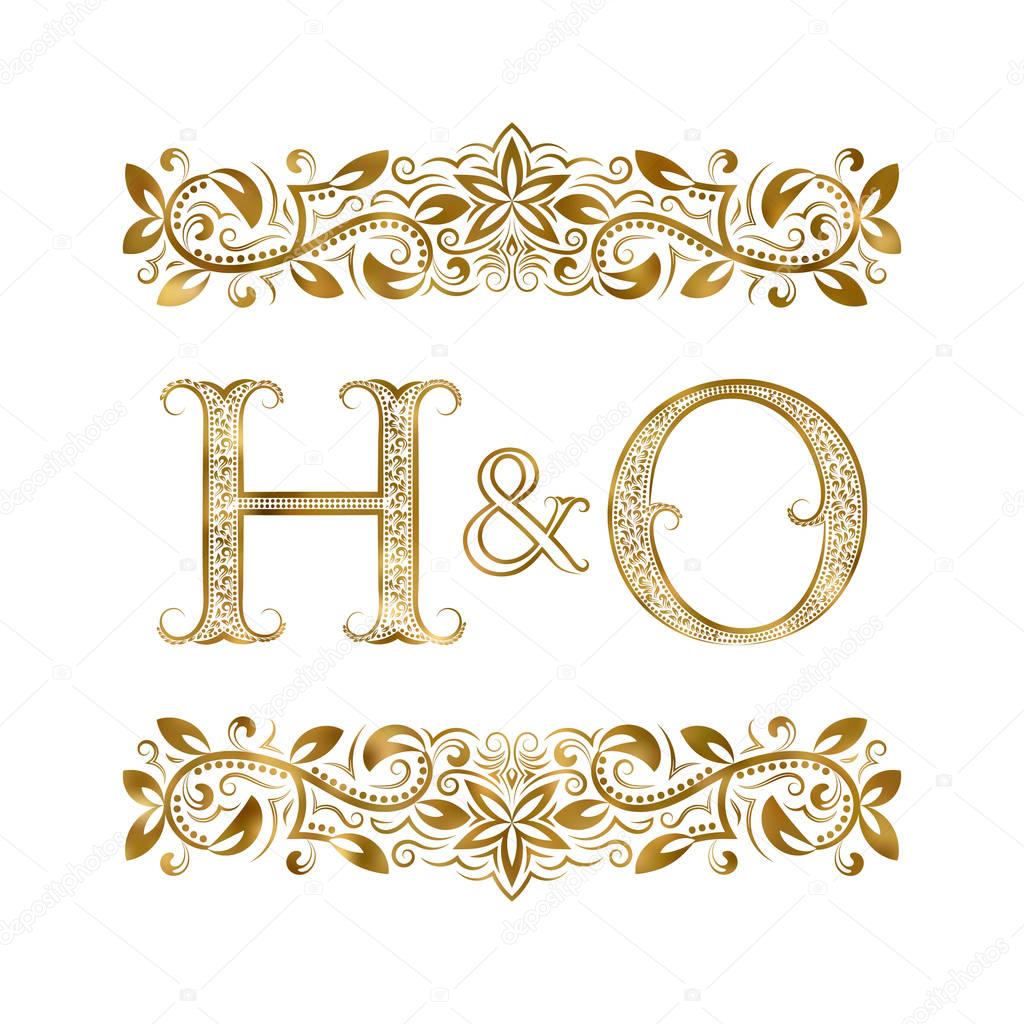 H and O vintage initials logo symbol. The letters are surrounded by ornamental elements.