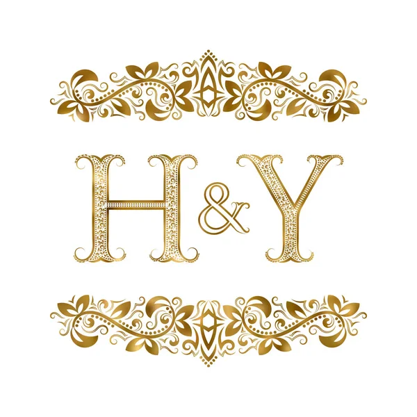 H and Y vintage initials logo symbol. The letters are surrounded by ornamental elements. — Stock Vector