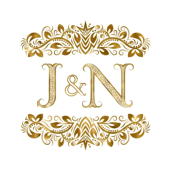 J e N sigle vintage simbolo del logo. Le lettere sono circondate da elementi ornamentali. Monogramma di nozze o partner commerciali in stile reale . — Vettoriale Stock