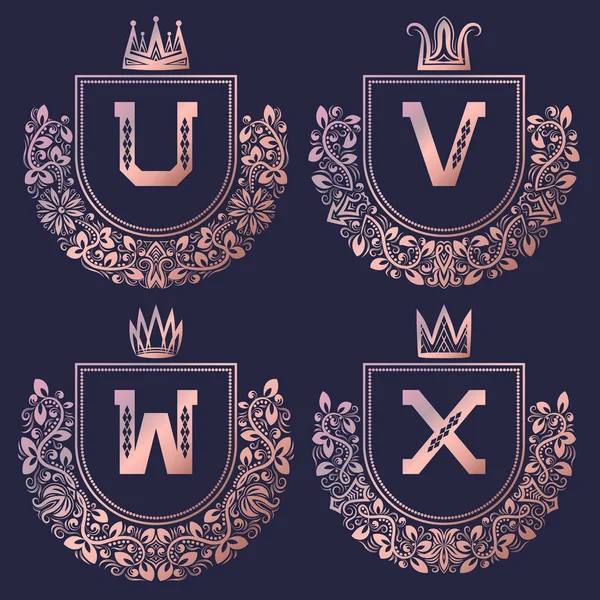 Rose gold coat of arms set in baroque style. Golden pink vintage logos with U, V, W, X monogram.