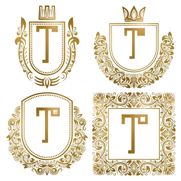 Golden vintage monograms set. Heraldic logos with letter T. — Stock Vector