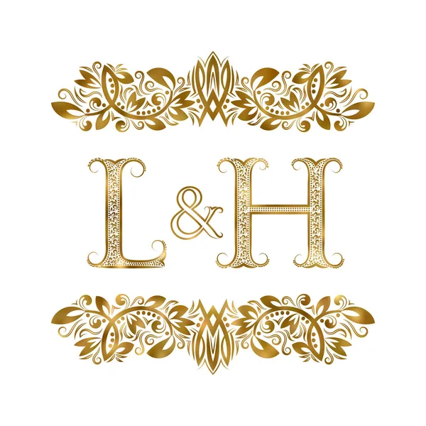 L and H vintage initials logo symbol. The letters are surrounded by ornamental elements. Wedding or business partners monogram in royal style. — Stock Vector