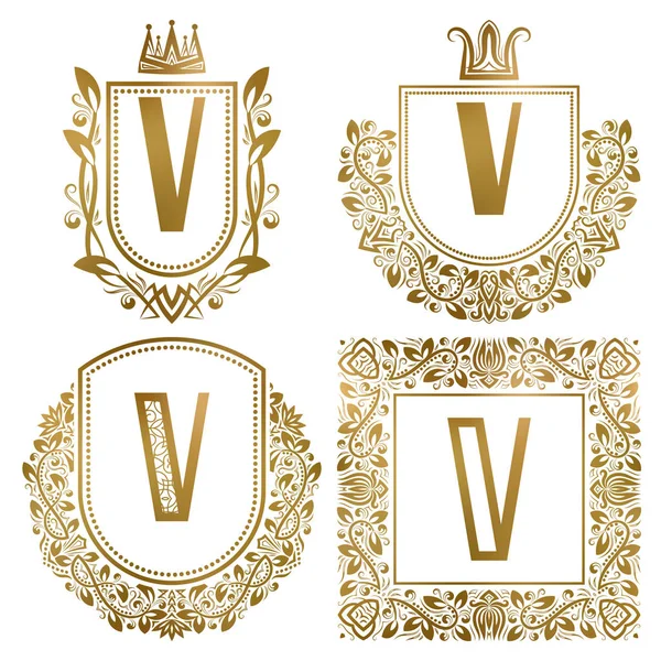 Golden vintage monograms set. Heraldic logos with letter V. — Stock Vector