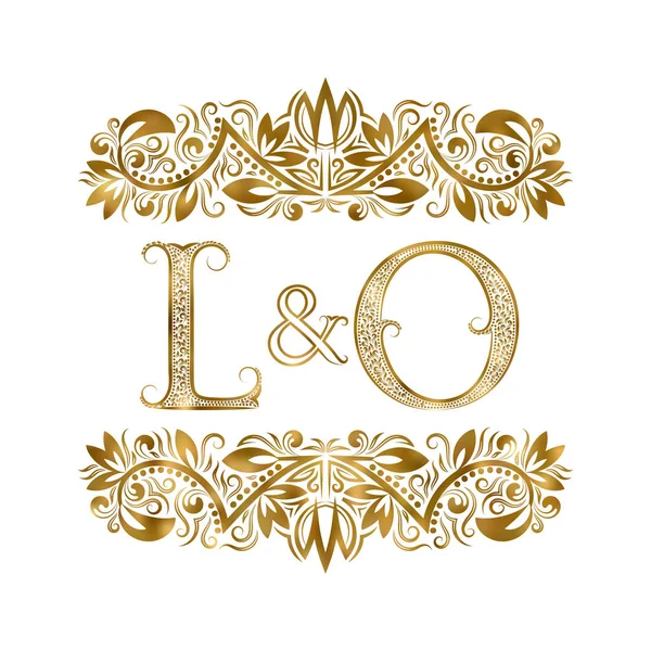 L y O vintage iniciales símbolo del logotipo. Las letras están rodeadas de elementos ornamentales. Boda o socios de negocios monograma en estilo real . — Archivo Imágenes Vectoriales