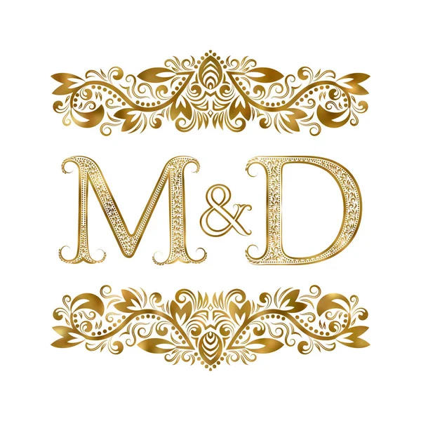 Символ логотипа с инициалами M и D. Буквы окружены декоративными элементами. Монограмма о свадьбе или деловых партнерах в королевском стиле . — стоковый вектор