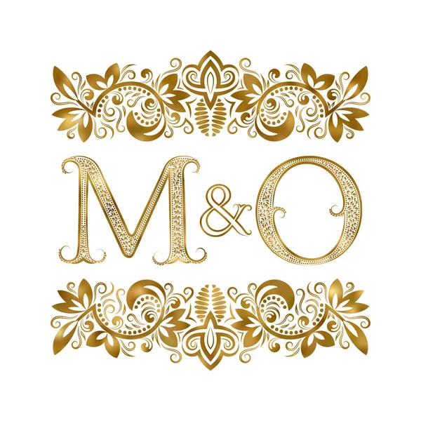 M 및 O 빈티지 이니셜 로고 기호입니다. 글자 장식 요소에 의해 포위 된다. 결혼식 또는 로얄 스타일에서 비즈니스 파트너 모노 그램. — 스톡 벡터