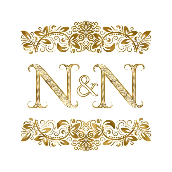 N and N vintage initials logo symbol. The letters are surrounded by ornamental elements. Wedding or business partners monogram in royal style. — Stock Vector