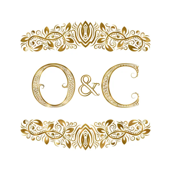 O and C vintage initials logo symbol. The letters are surrounded by ornamental elements. Wedding or business partners monogram in royal style. — Stock Vector