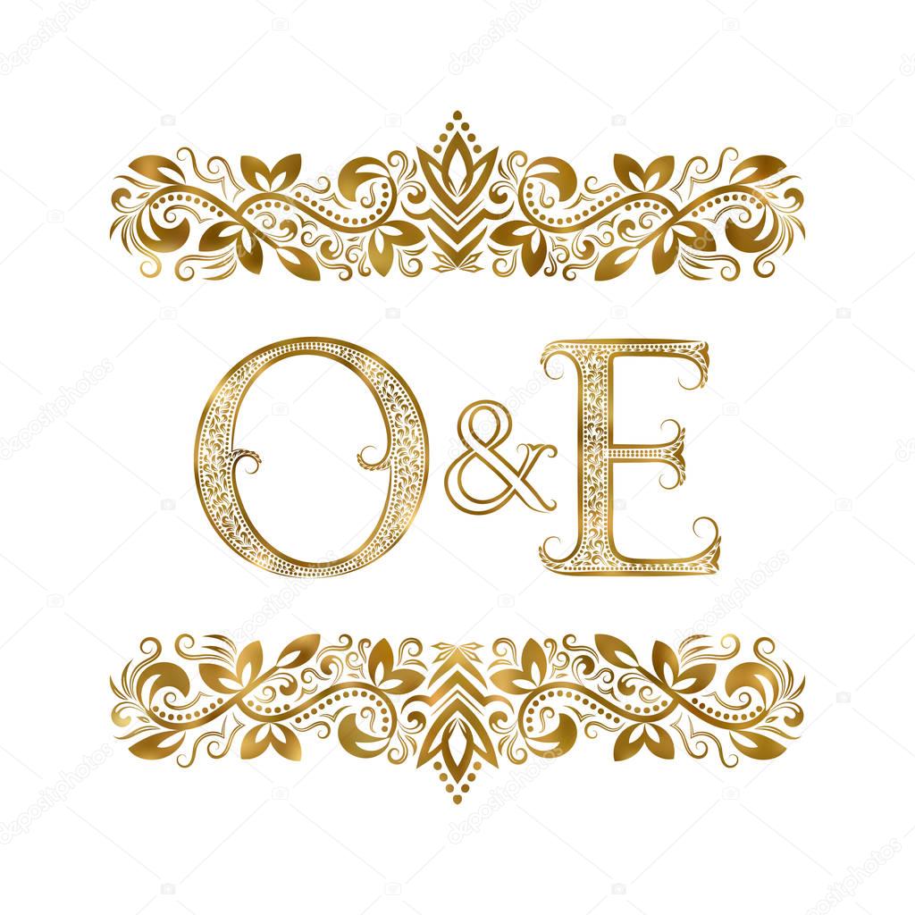 O and E vintage initials logo symbol. The letters are surrounded by ornamental elements. Wedding or business partners monogram in royal style.
